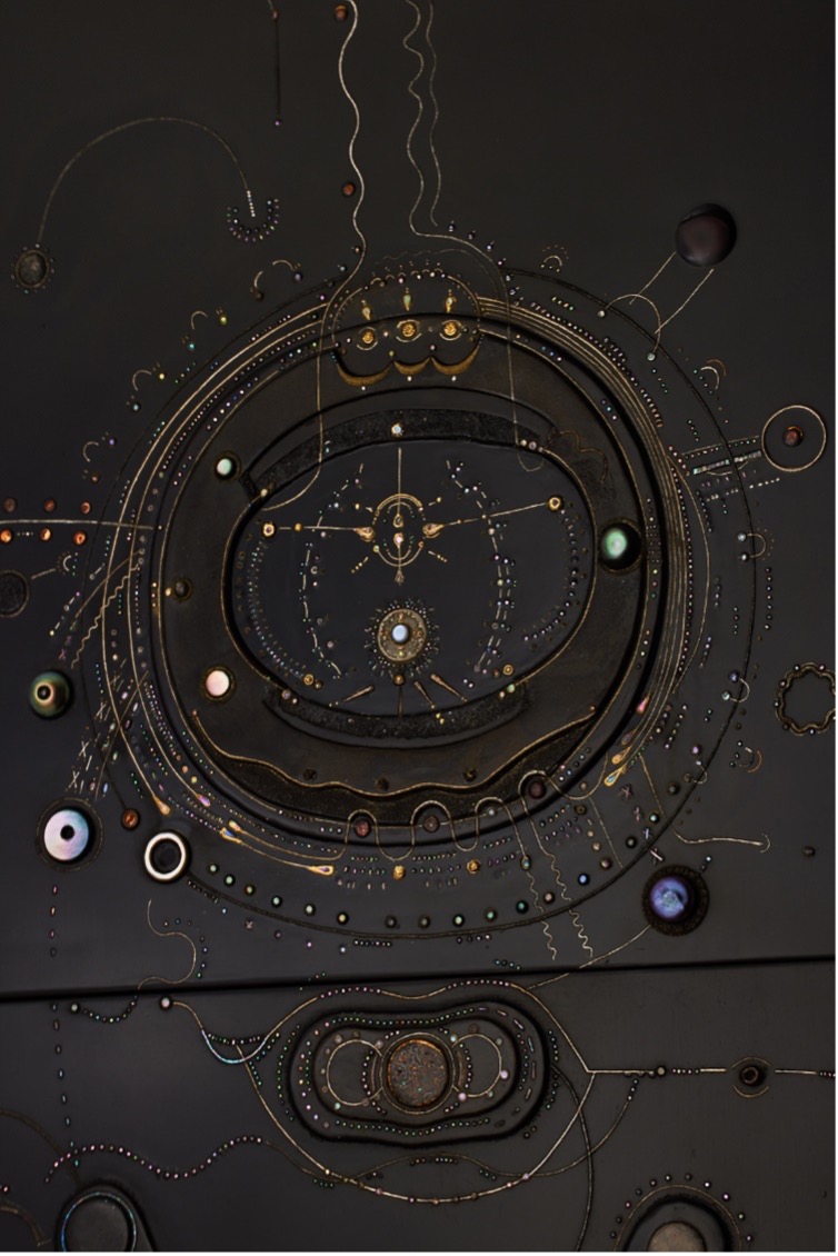 A piece of art by Chinese artist Pan Caoyuan, made of materials including lacquer, mother-of-pearl, gold, silver and tin, is hung on the wall as part of the Today Art Museum's art and technology themed biennial in Beijing, which opened on Sunday, July 23, 2023. /CGTN