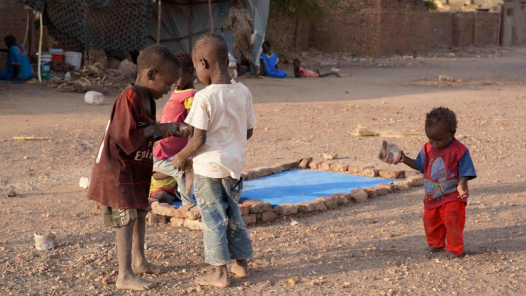 Internally displaced Sudanese children play outside while residing in the Hasahisa secondary school, which was transformed to house people fleeing violence in the war-torn country, in Al Hasahisa, Sudan, July 10, 2023. /CFP
