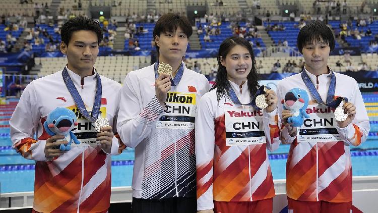 Qin Haiyang shines again as China add two historic golds at Fukuoka - CGTN