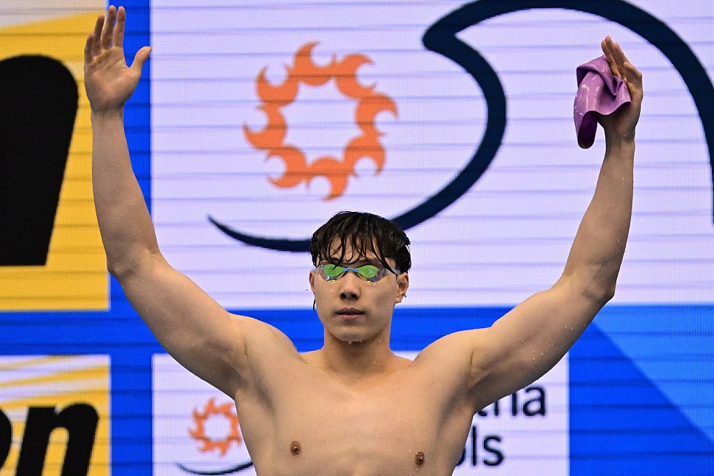 China's Qin Haiyang reacts after winning the final of the men's 50m breaststroke event at the World Aquatics Championships in Fukuoka, Japan, July 26, 2023. /CFP