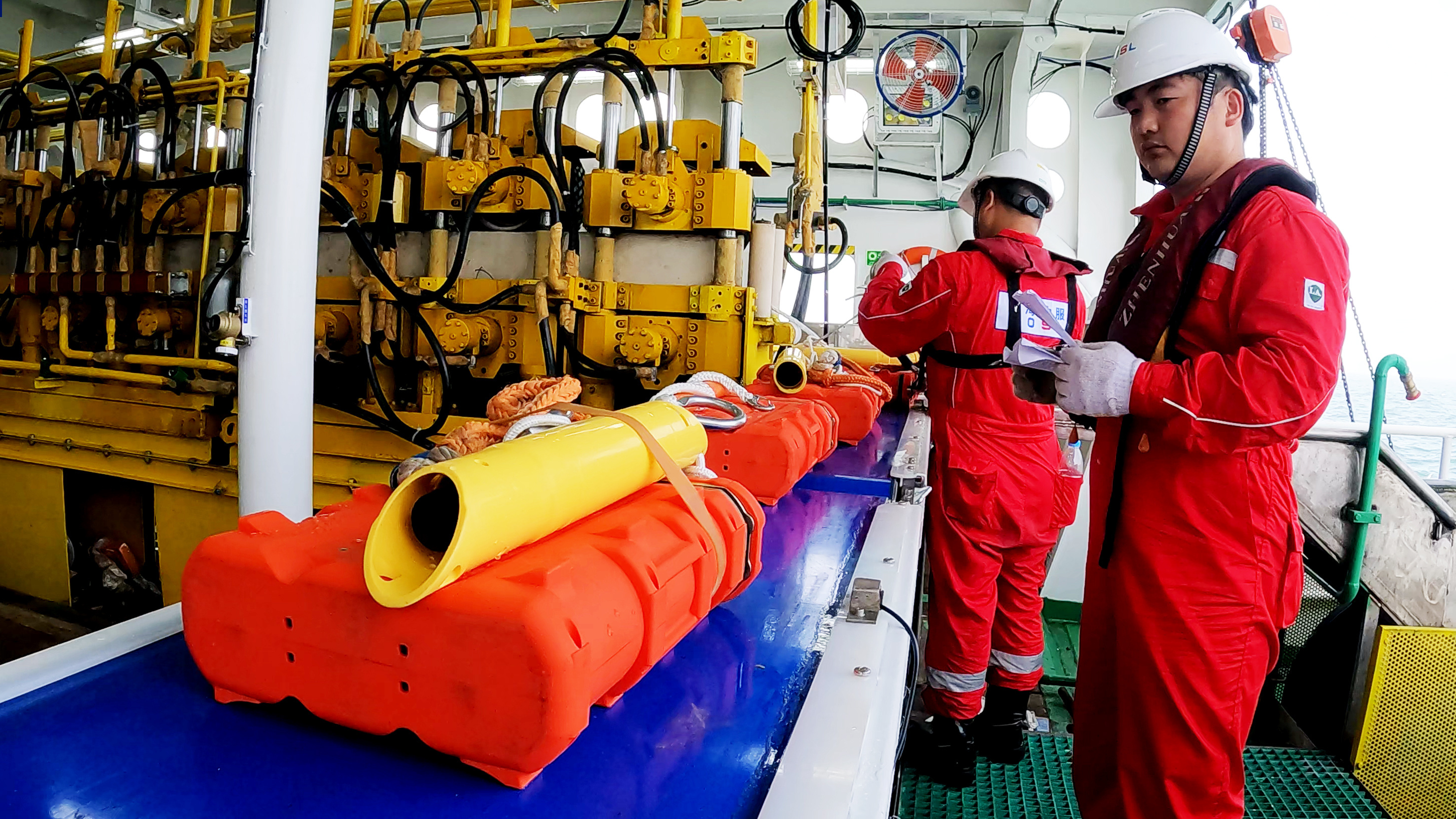 Technicians check China's self-developed undersea seismic exploration sensor Haimai, or 