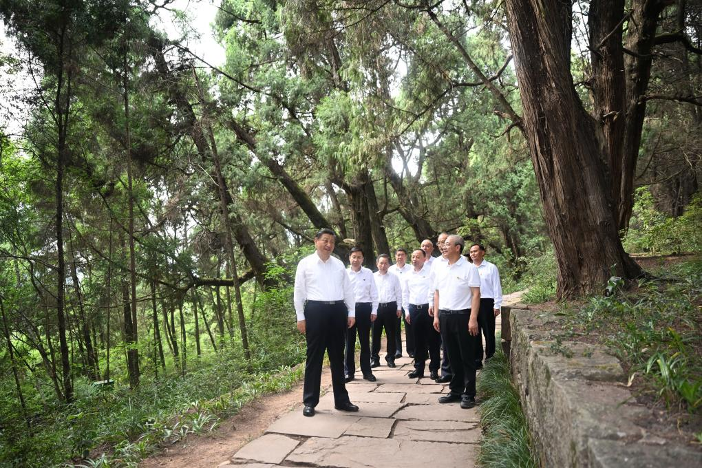 Chinese President Xi Jinping visits the site of a section of an ancient road system known as 