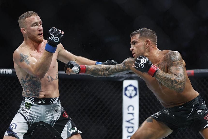 Dustin Poirier cuts Justin Gaethje above the eye with a straight right. /Zuffa