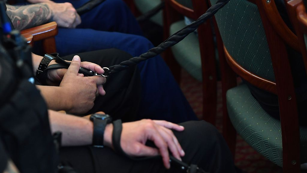 Defendants listen to the final verdict in their trial for the gruesome deaths of 71 migrants who suffocated in a lorry nearly four years ago at a court in Szeged, Hungary, June 20, 2019. /CFP
