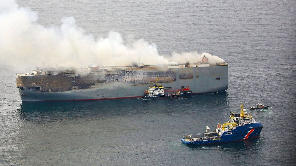 This handout photograph taken on July 28, 2023 from the Coast Guard plane and released on July 29, 2023 by the Dutch coastguards, shows a fire aboard the Panamanian-registered car carrier ship Fremantle Highway. /CFP