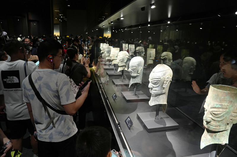 Visitors flock to the new exhibition hall at the Sanxingdui Museum in Guanghan City, Sichuan Province, July 30, 2023. /CFP