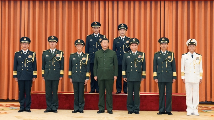 Xi Jinping, chairman of the Central Military Commission (CMC), and other leaders pose for a group photo with military officers who have been promoted to the rank of general in Beijing, capital of China, July 31, 2023. /Xinhua