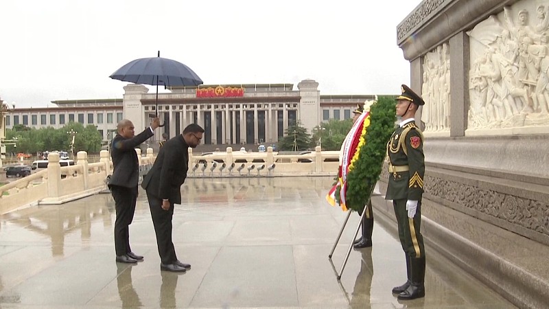 Guyana's President Irfaan Ali lays a wreath at the Monument to the People's Heroes and bows in front of it, in Beijing, China, July 31, 2023. /CFP