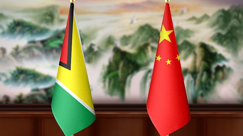 National flags of Guyana and China. /CFP
