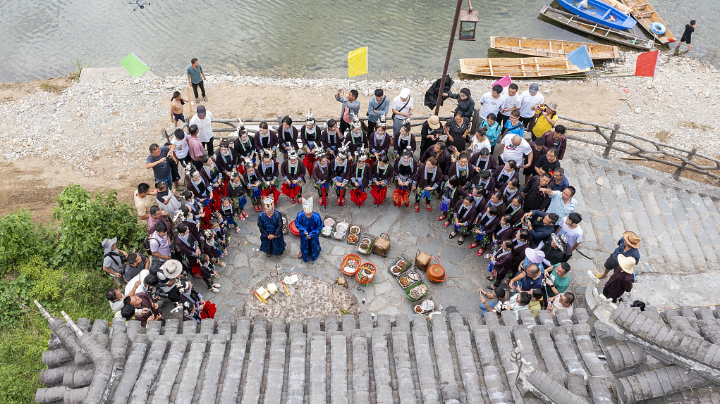 This photo taken on July 31, 2023, shows the Zhuang people paying their respects to the 