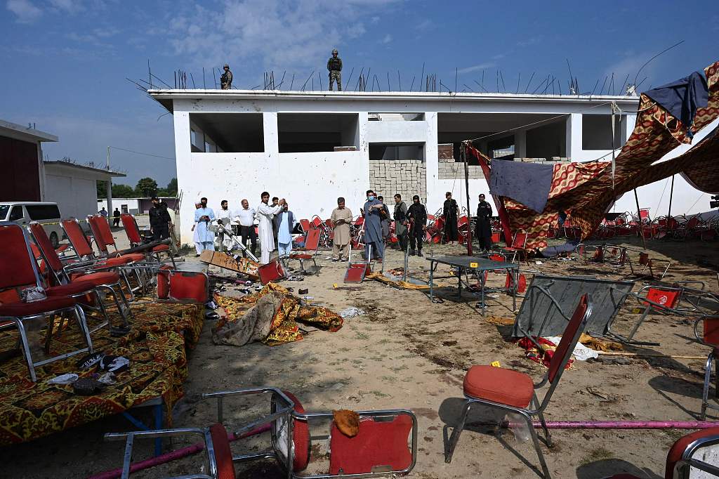 Security personnel examine the site of a bomb blast in Bajaur district of Khyber Pakhtunkhwa Province, Pakistan, July 31, 2023. /CFP