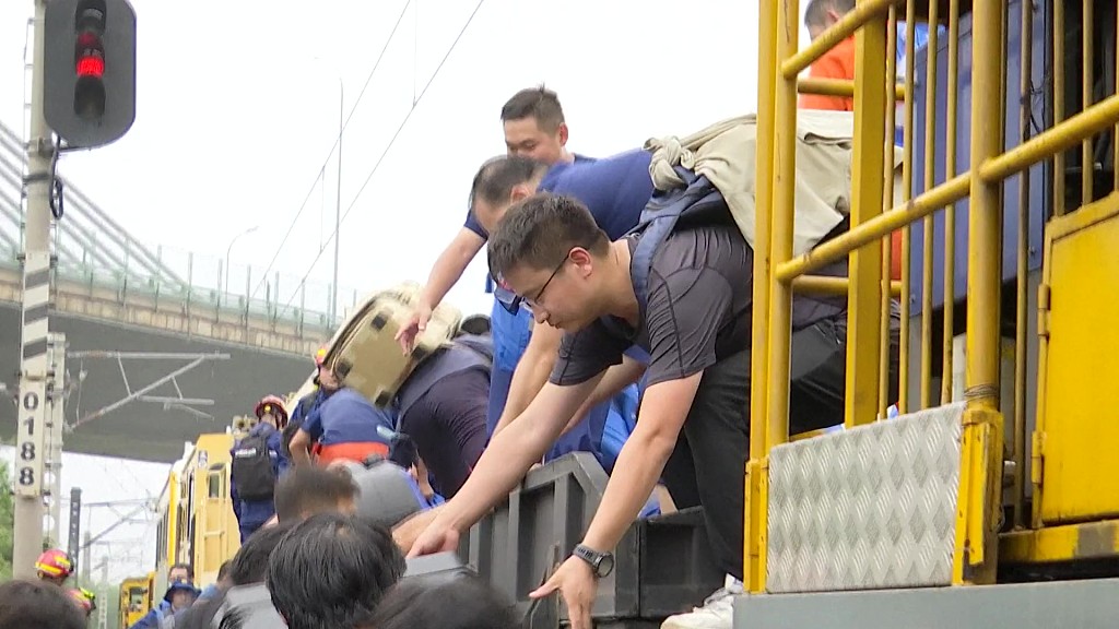 Passengers trapped on the train were rescued in Beijing on August 2, 2023. /CFP