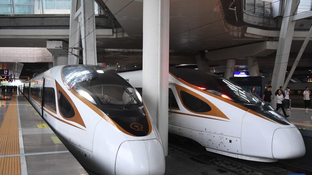 A train operating on the Beijing-Tianjin Intercity Railway (L) waits for passengers at the Beijing South Railway Station in Beijing, capital of China, August 1, 2023. /Xinhua