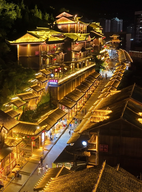 Youzhou Ancient Town is illuminated at night in Youyang Tujia and Miao Autonomous County, Chongqing Municipality. /CFP