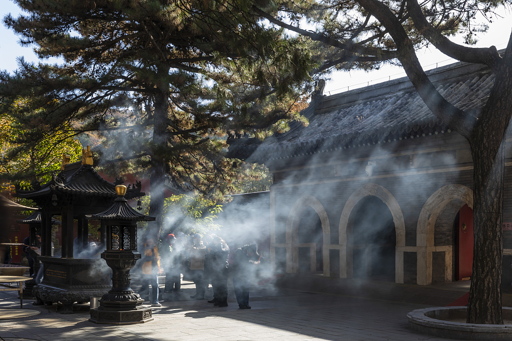 A file photo shows sunlight on the Buddha hall of the Tanzhe Temple in Beijing, China. /CFP