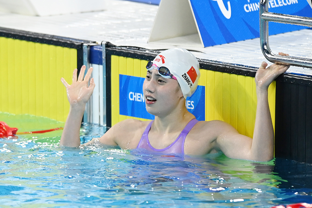 Zhang Yufei reacts after winning the women's 50m butterfly final at the World University Games in Chengdu, Sichuan Province, China, August 2, 2023. /CFP