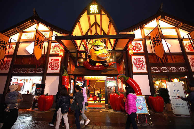 Shops are illuminated at the Shangzhongshun Tourism and Leisure Block in Leshan City, Sichuan Province. /CFP