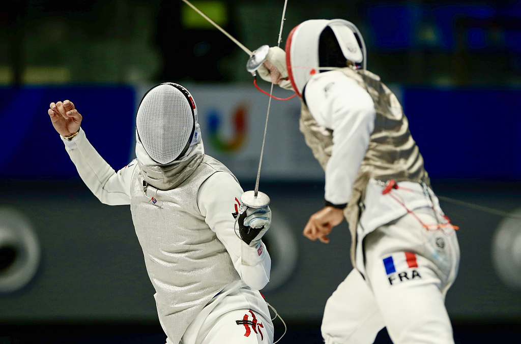 Cheng Ka-long (L) of China's Hong Kong fights Pierre Loisel of France during the fencing men's foil individual final at the World University Games in Chengdu, China, August 4, 2023. /CFP