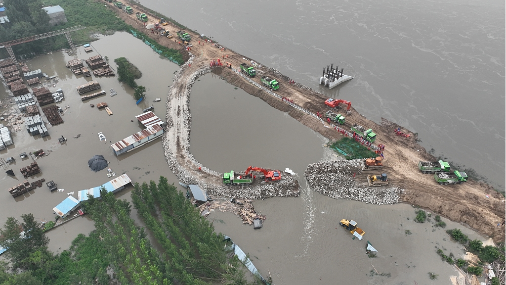 Live: Rescue operations underway in northern China after heavy floods