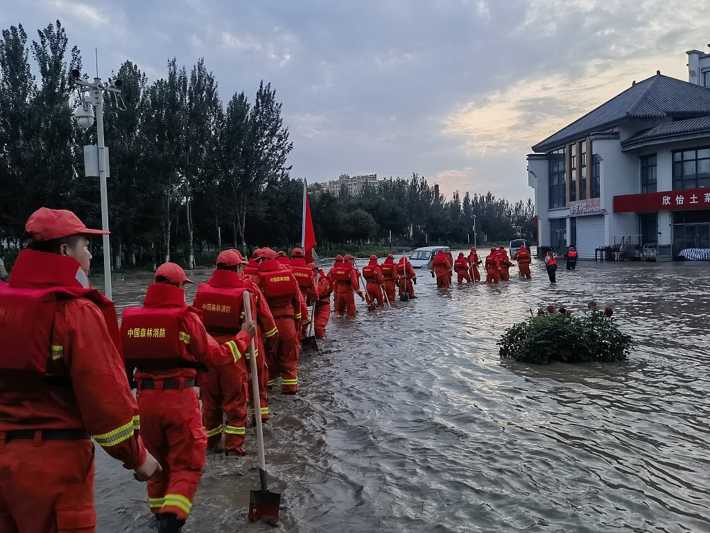 Firefighters are on a mission of rescue and flood control in Shangzhi, Heilongjiang Province, August 4, 2023. /CFP
