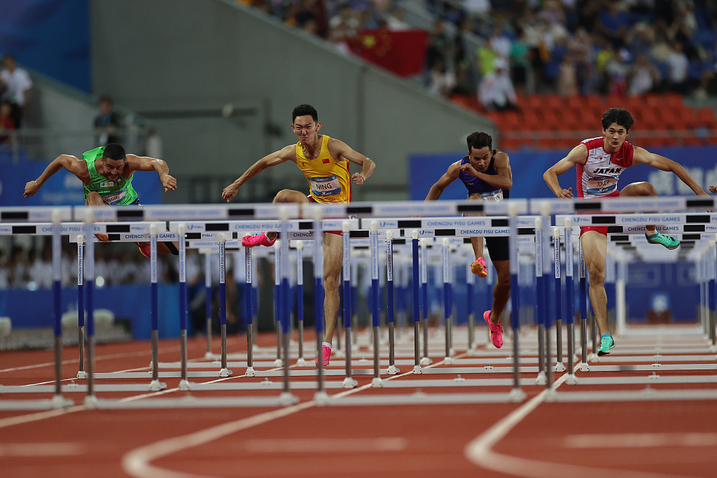 Athletes compete in the men's 110m hurdles final at the World University Games in Chengdu, China, August 5, 2023. /CFP