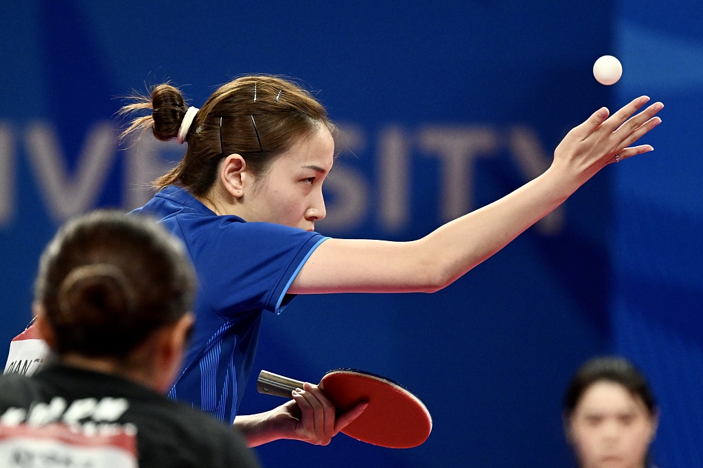 Qian Tianyi of China serves during the women's table tennis singles final against Kyoka Idesawa of Japan at the World University Games in Chengdu, China, August 5, 2023. /CFP