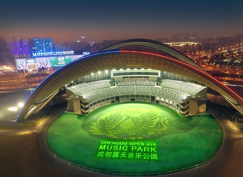 The Chengdu Open Air Music Park features a large main stage, green landscaping and sports facilities illuminated by colorful lights in Sichuan Province. /CFP