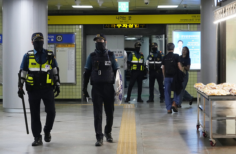 Police officers patrol the Ori subway station following Thursday's attack in Seongnam, South Korea, August 4, 2023. /CFP