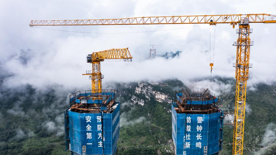 This aerial photo shows the construction site of the Huajiang grand canyon bridge in southwest China's Guizhou Province, August 2, 2023. /Xinhua