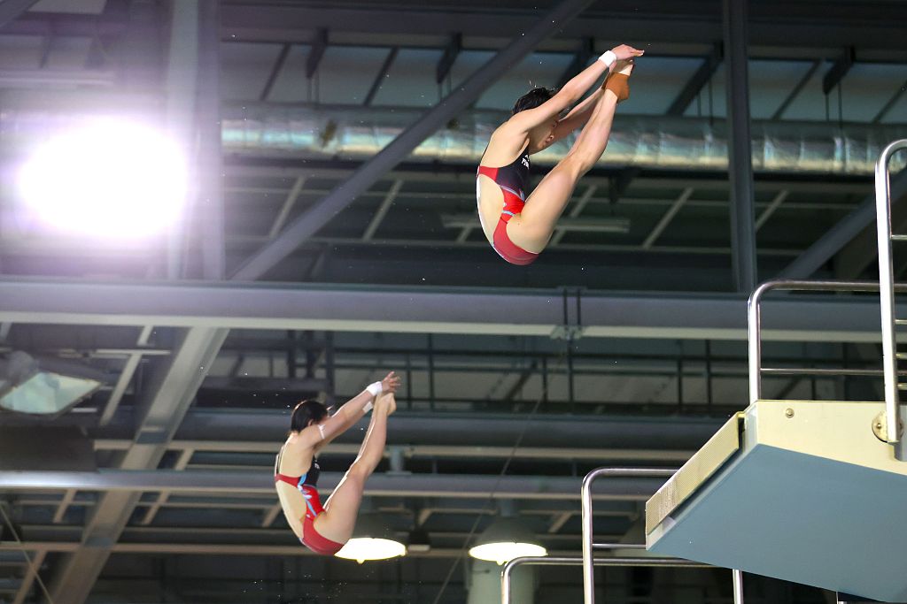 Chen Yuxi and Quan Hongchan of China compete in the women's 10-meter synchronized platform final in the World Aquatics Diving World Cup Super Final in Berlin, Germany, August 4, 2023. /CFP