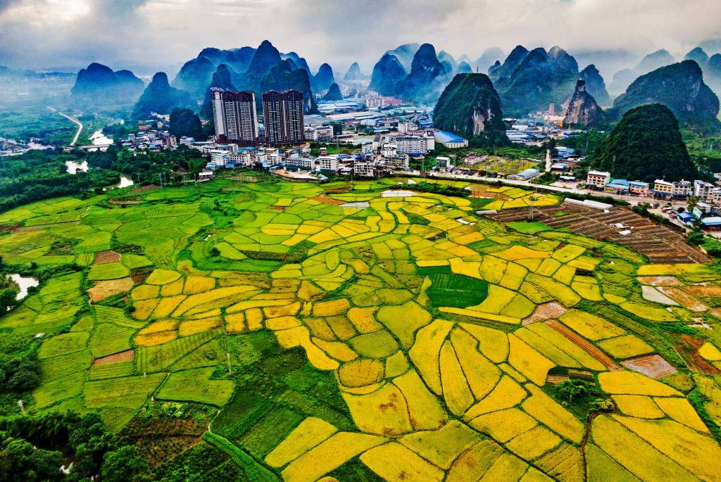 An aerial photo shows the idyllic landscape of Rongshui Miao Autonomous County, south China's Guangxi Zhuang Autonomous Region, August 7, 2023. /CFP