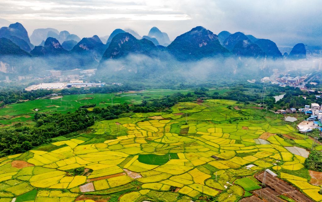 An aerial photo shows the idyllic landscape of Rongshui Miao Autonomous County, south China's Guangxi Zhuang Autonomous Region, August 7, 2023. /CFP