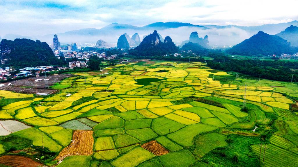 An aerial photo shows the idyllic landscape of Rongshui Miao Autonomous County, south China's Guangxi Zhuang Autonomous Region, August 7, 2023. /CFP