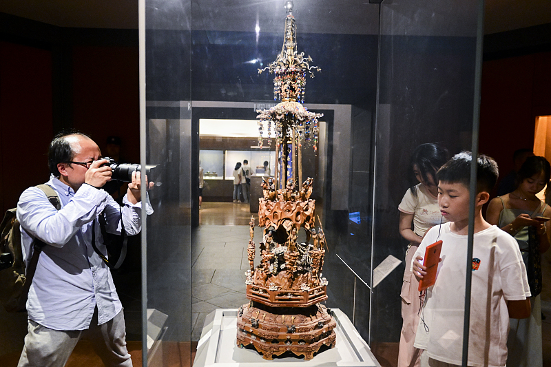 Visitors take a nighttime tour of the Suzhou Museum in Jiangsu Province, August 6, 2023. /CFP