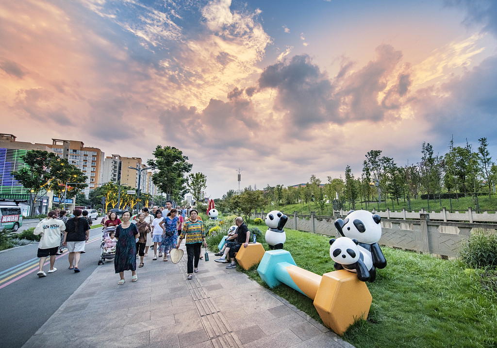 Benches in the shape of dumbbells along with panda figures in a park in Chengdu, China, July 30, 2023. /CFP