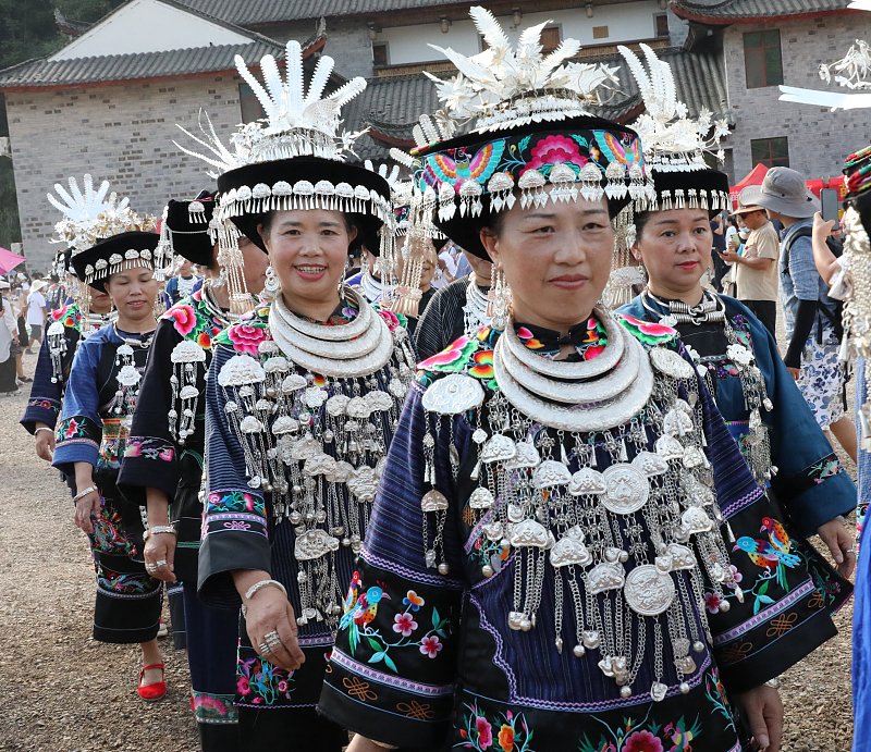 Miao women dress in traditional costumes to celebrate the Ganqiu Festival in Huayuan County, Hunan Province. /CFP