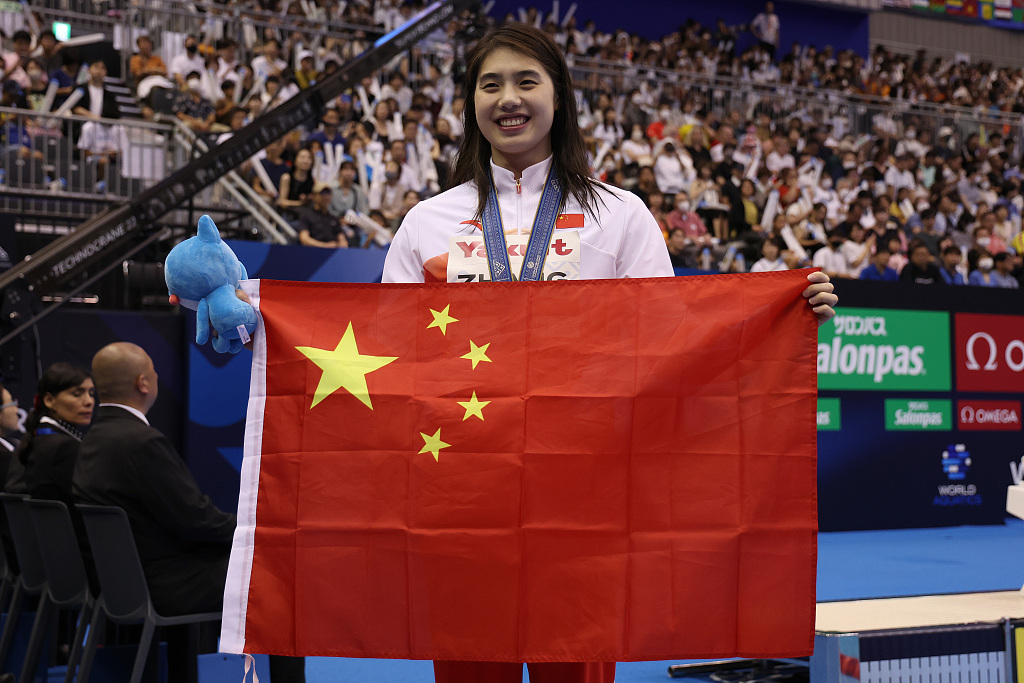 Zhang Yufei of China wins the women's 100-meter butterfly gold medal in the World Aquatics Championships in Fukuoka, Japan, July 24, 2023. /CFP