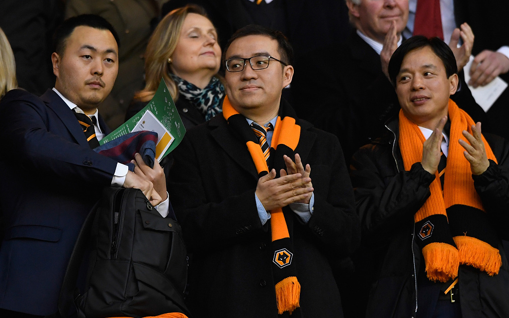 Wolves chairman Jeff Shi (C) looks on before the Emirates FA Cup Fifth Round match at Molineux in Wolverhampton, England, February 18, 2017. /CFP