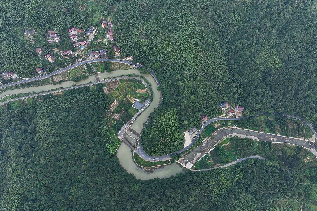 A photo taken on August 9, 2023, shows an aerial view of the mountain where the cliffside stone carvings were discovered. Huzhou, Zhejiang, China. /CFP