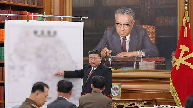 DPRK leader Kim Jong Un (standing) presides over a meeting of the Central Military Commission of the Workers' Party at the party's headquarters in Pyongyang, DPRK, August 9, 2023, in this photo provided by the Korean Central News Agency. /CFP