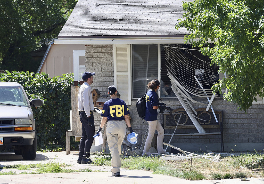Law enforcement officials investigate the scene of a shooting involving the FBI in Provo, Utah, U.S., August 9, 2023. /CFP
