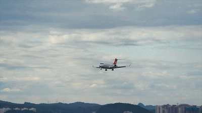 An ARJ21 plane landing at airport. /CMG