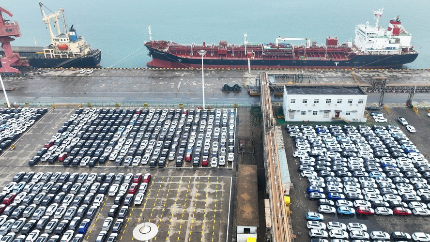 This aerial photo shows vehicles to be exported at a port in Lianyungang, east China's Jiangsu Province, January 13, 2023. /Xinhua