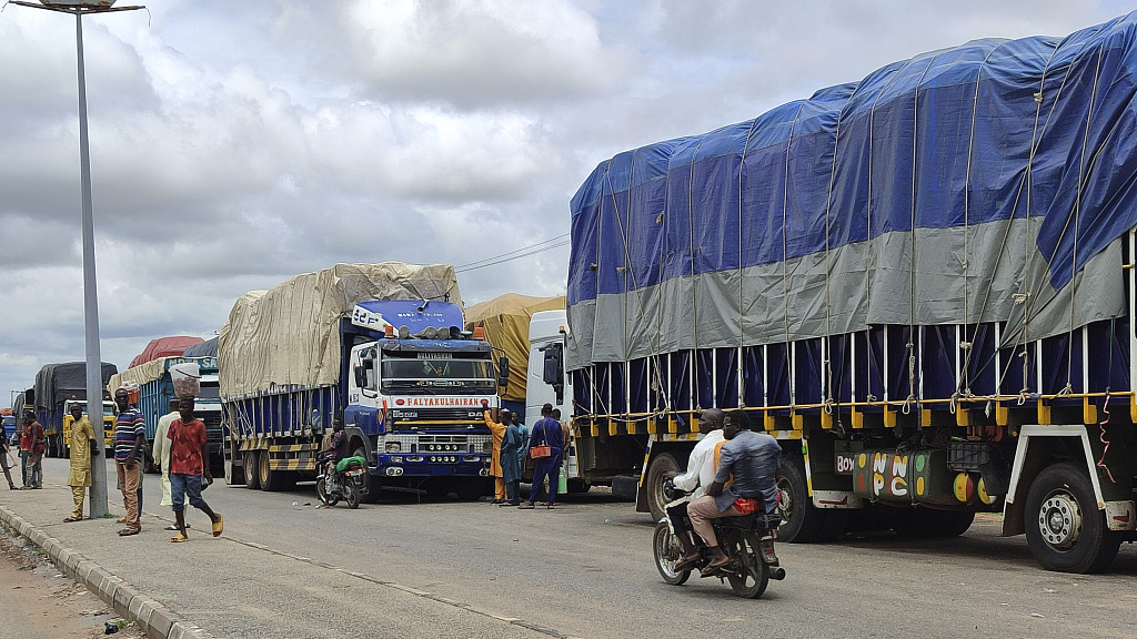 Following West Africa regional bloc's decision to shut borders with Niger, stranded trucks with goods are seen at the border between Nigeria and Niger in Jibia, Nigeria, August 7, 2023. /CFP