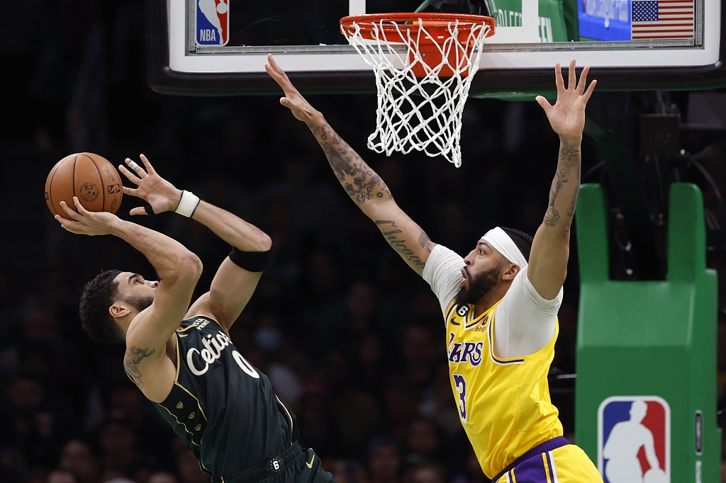 Anthony Davis (R) of the Los Angeles Lakers tries to deflect a shot by Jayson Tatum of the Boston Celtics in the game at TD Garden in Boston, Massachusetts, January 28, 2023. /CFP