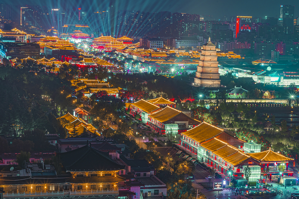 This file photo shows a night view of the Dayan Pagoda and the Datang Everbright City in Xi'an, Shaanxi Province. /CFP