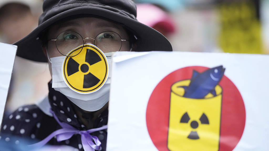 A protester against Japan's plan to release treated radioactive water from the wrecked Fukushima nuclear power plant, in Seoul, South Korea, August 12, 2023. /CFP