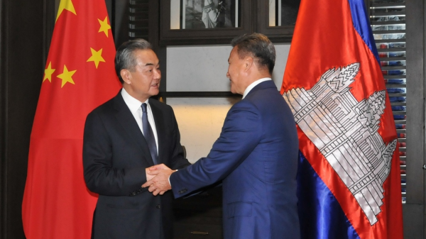 Chinese Foreign Minister Wang Yi talks with Cambodian Deputy Prime Minister-designate Sun Chanthol in Phnom Penh, Cambodia, August 12, 2023. /Chinese Foreign Ministry
