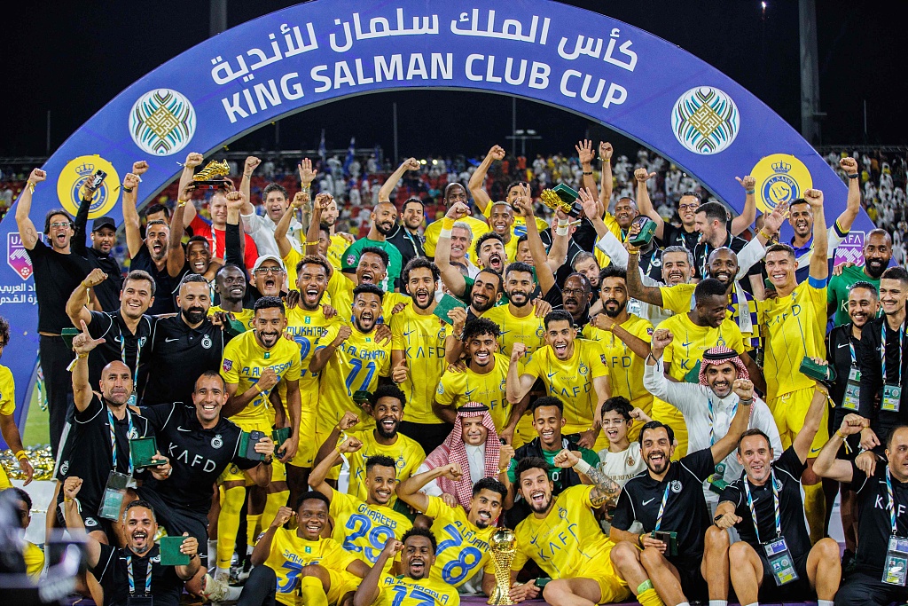 Team Al-Nassr celebrate after winning the Arab Club Champions Cup title in Riyadh, Saudi Arabia, August 12, 2023. /CFP