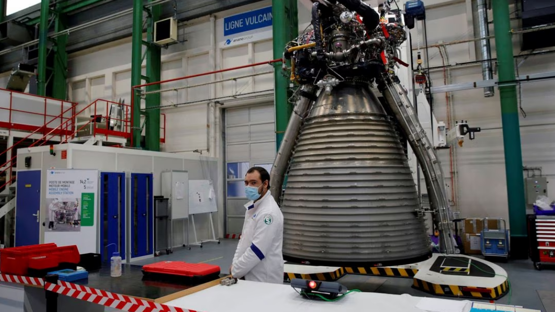 A worker of Ariane Group stands in front of a Ariane 6 rocket's Vulcain 2.1 engine, prior to the visit of French President Emmanuel Macron, in Vernon, France, January 12, 2021. /Reuters
